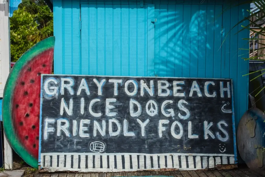 grayton-beach-nice-dogs-friendly-folks-sign - Living on 30A Florida Hand-painted Grayton Beach sign reading Nice Dogs Friendly Folks with watermelon art