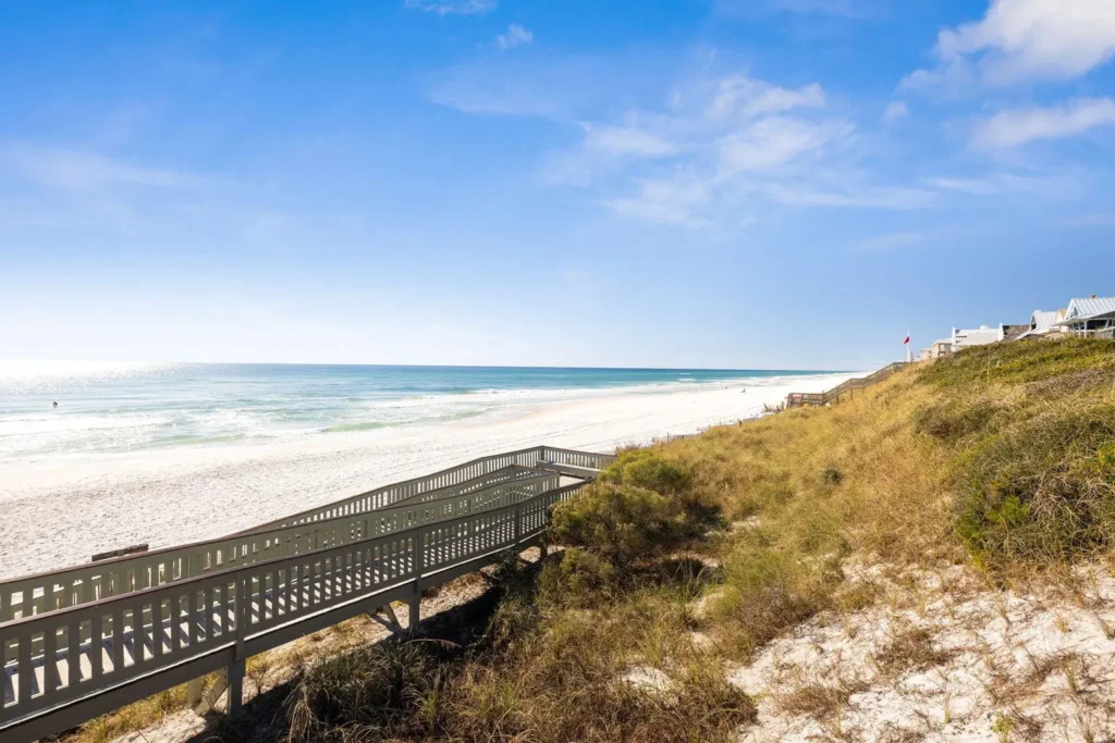 Rosemary Beach boardwalk through protected dunes leading to white sand Gulf beach
