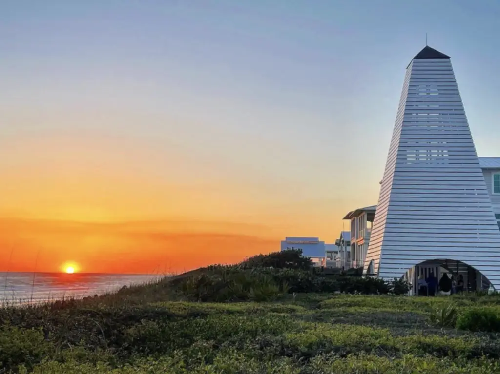 Sandy dune walkover path leading to a Seaside Florida beach pavilion along the Gulf Coast
