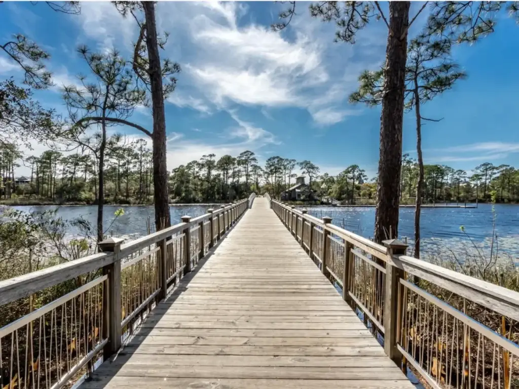 watercolor-fl-western-lake-bridge-walkway - Living on 30A Florida Wooden bridge walkway crossing Western Lake in WaterColor Florida