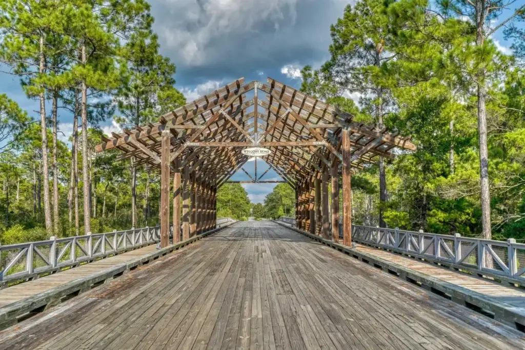 The covered bridge entrance of Naturewalk at Seagrove is an iconic landmark on 30A