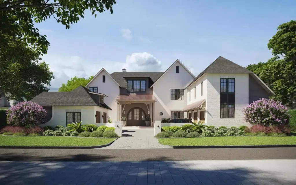 Front view of a large white brick house with symmetrical gables, landscaped lawn, and a paved driveway.